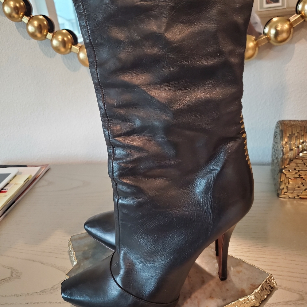 Black leather and grommet boots